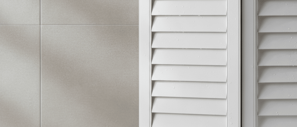 White waterproof bathroom shutters with tiled walls